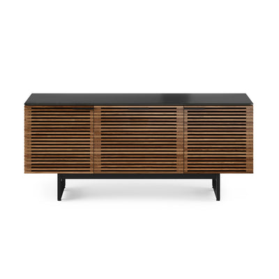 BDI Corridor TV and media unit in natural walnut with slatted doors on white background