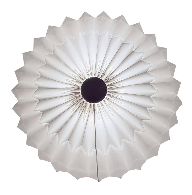 Le Klint 33-45 ceiling light white plastic viewed from below with light on.