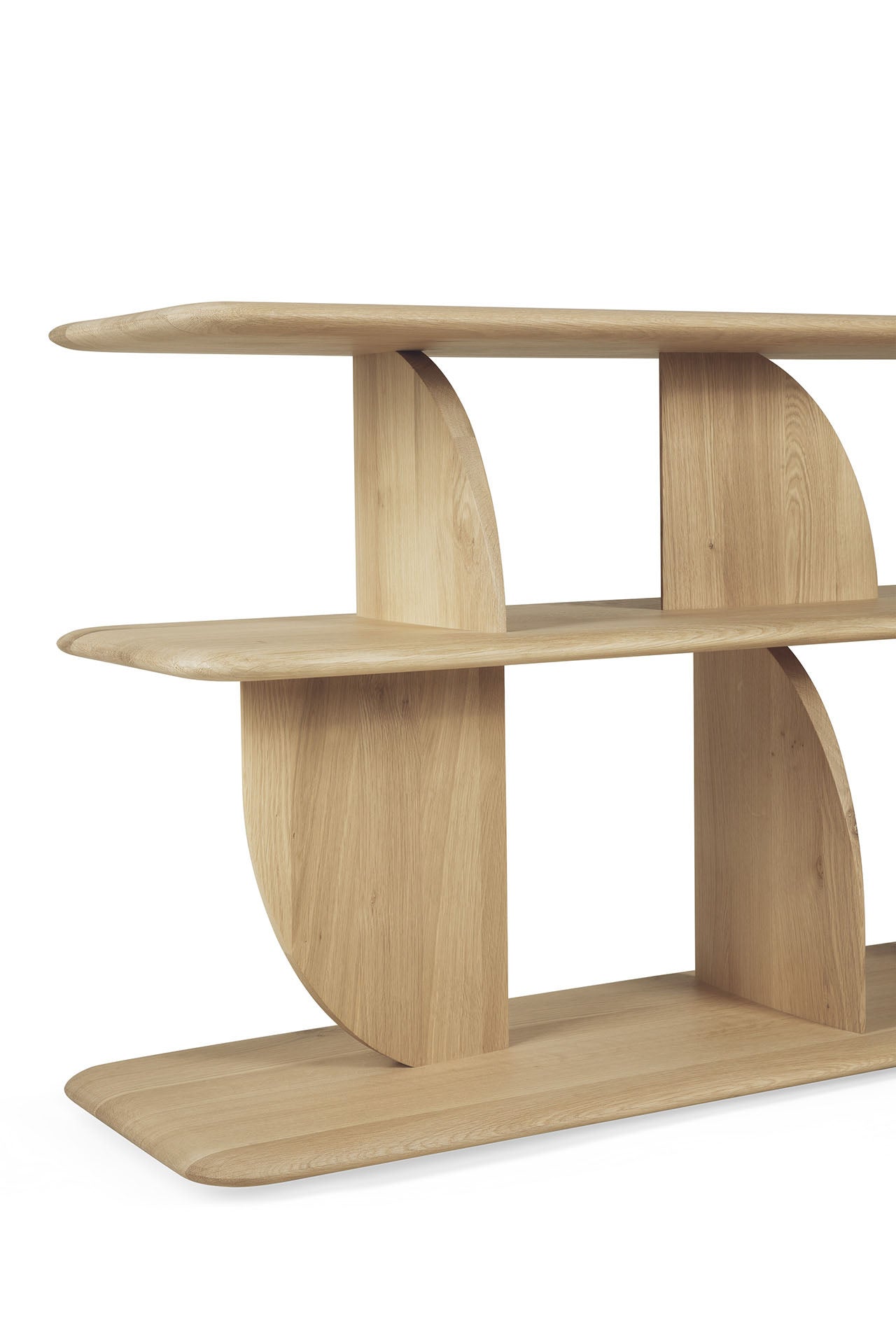  Minimalist hallway console in solid oak featuring curved geometric supports and clean lines.