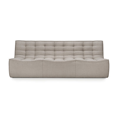 Three seat sofa shown in ecru colored fabric on white background with shadows