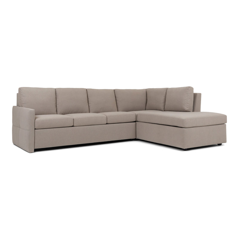 Three seat plus chaise end American Leather bentley Comfort Sleeper in beige fabric