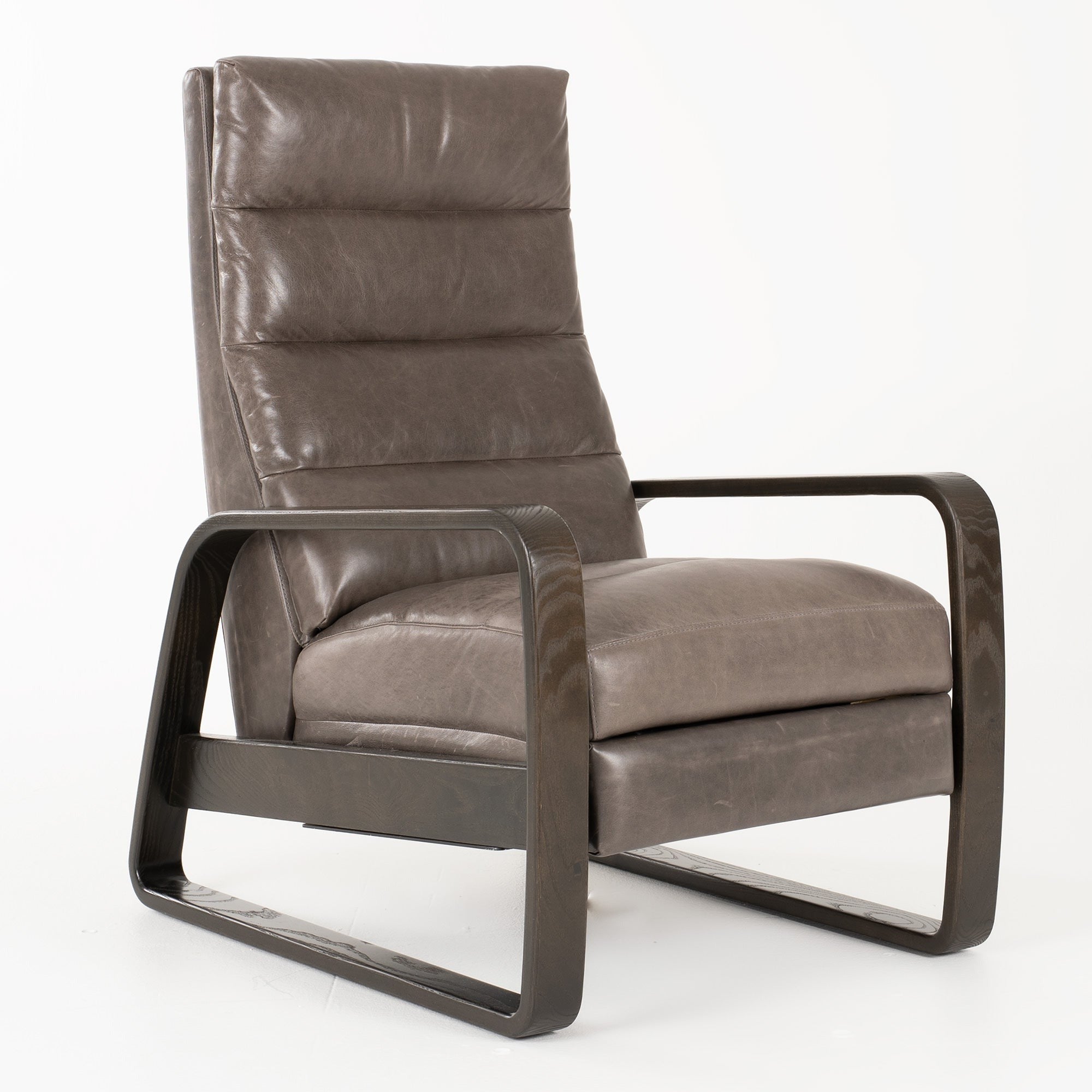 waxy leather with a patina horizontal pillowed stitching on dark brown stained ash arms