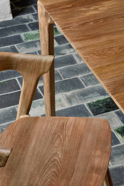 Close up of natural teak dining chair GALLERY