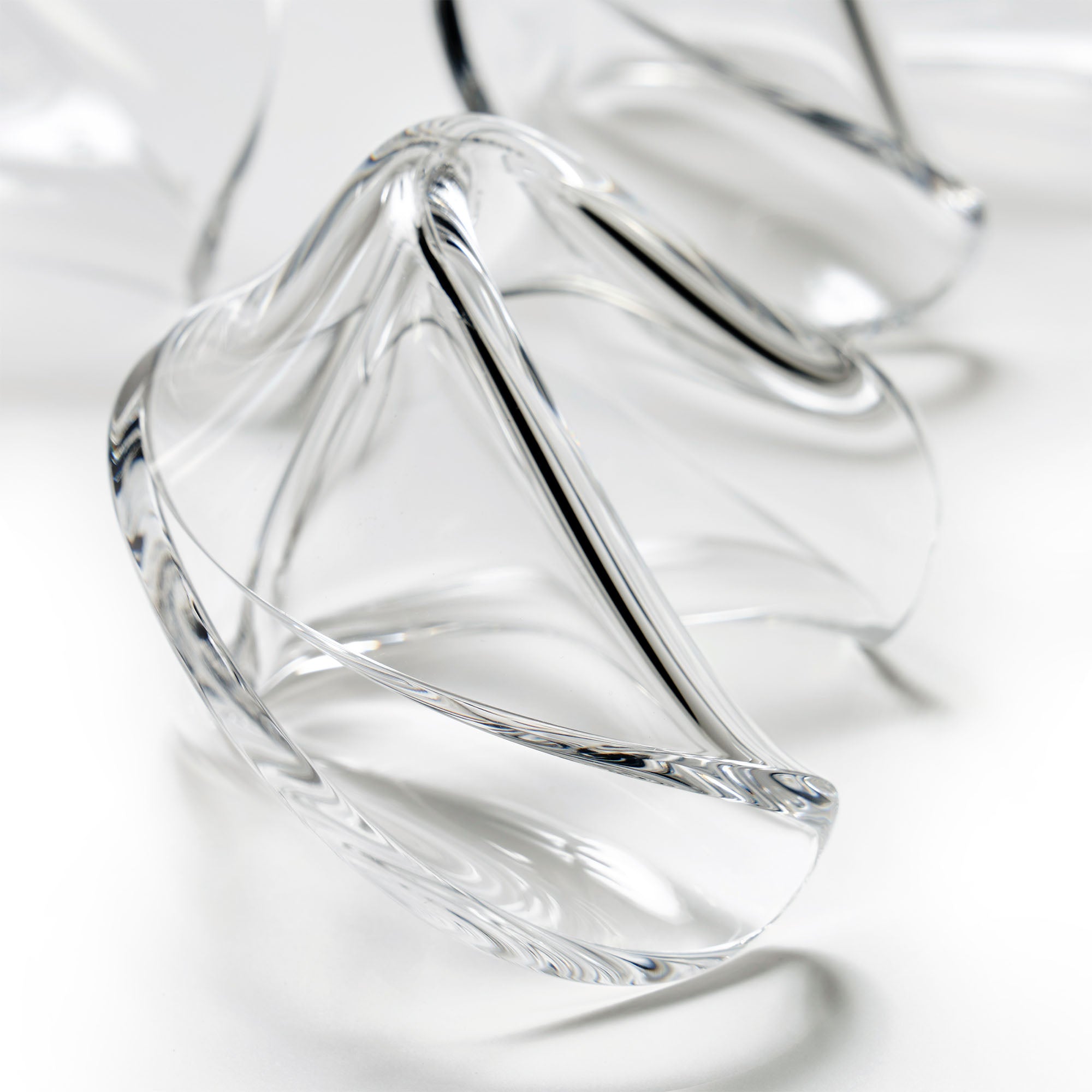 Close-up of a clear acrylic fortune cookie