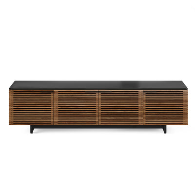 BDI Corridor 8173 low media tv stand with horizonal slatted doors made of natural walnut  topped with a black glass finish