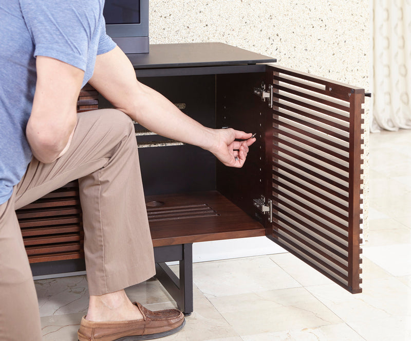 Adjustable shelves have screw in metal-to-metal shelf pins