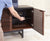 Setting an adjustable shelf in the right facing cabinet