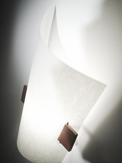 Domus Licht Plan B Maron Oil Sconce on white wall showing overhead soft bright white light GALLERY