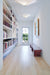 Long hallway with Le Klint two 26 ceiling lights  GALLERY