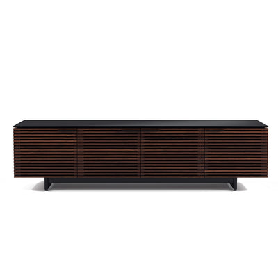 BDI Corridor 8173 low media tv stand with horizonal slatted doors made of chocolate stained walnut finish topped with a black glass finish