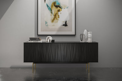 BDI Tanami 7109 Black with Brass legs Storage console front view with artwork above and accessories on top GALLERY